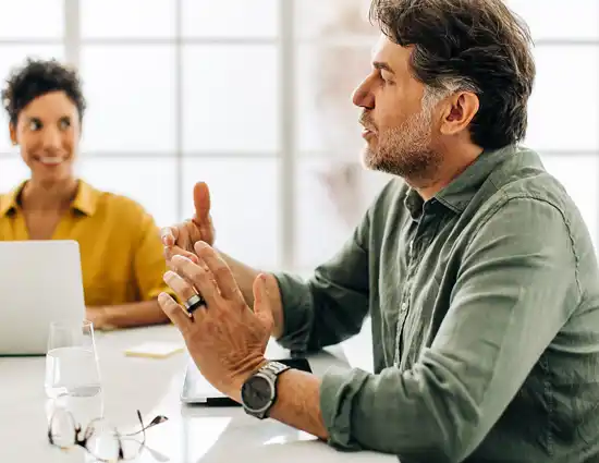 Man Presenting At Computer