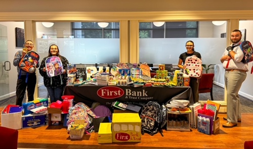 Pack the Bus Donation Table at the Pinnacle Office