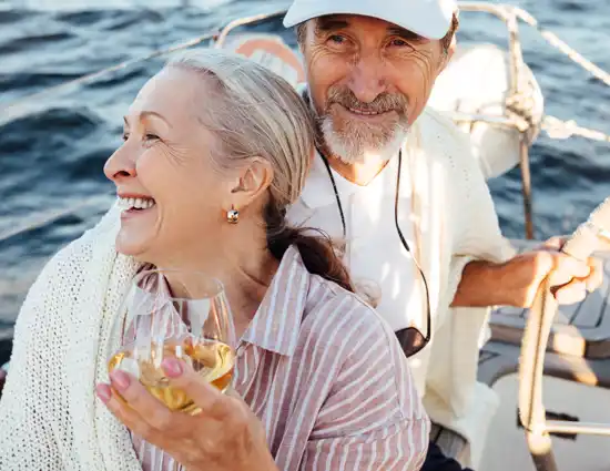 Smiling Elderly Couple Enjoying Boat