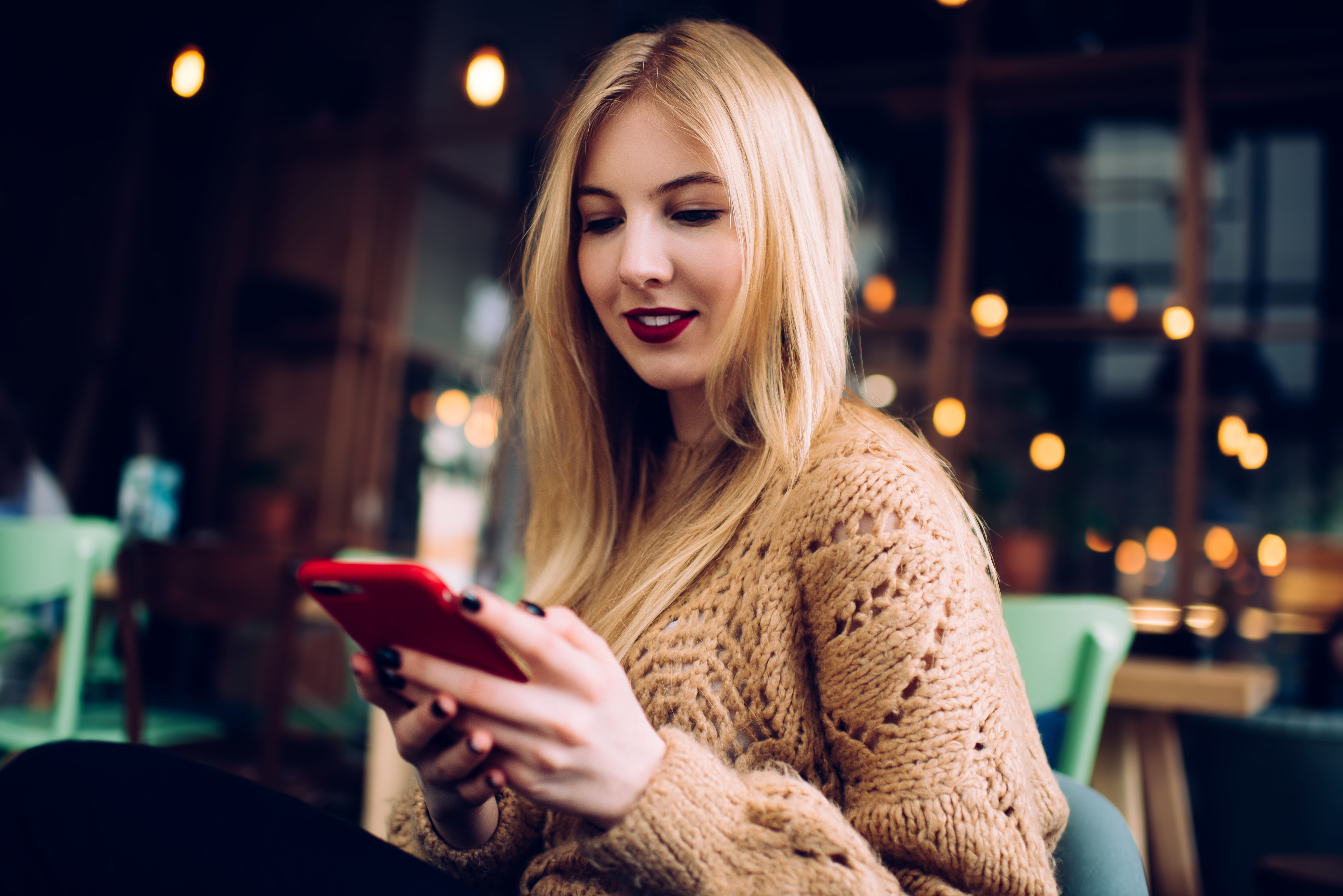 Positive Woman Using Smartphone In Cafe 2023 11 27 05 34 48 Utc