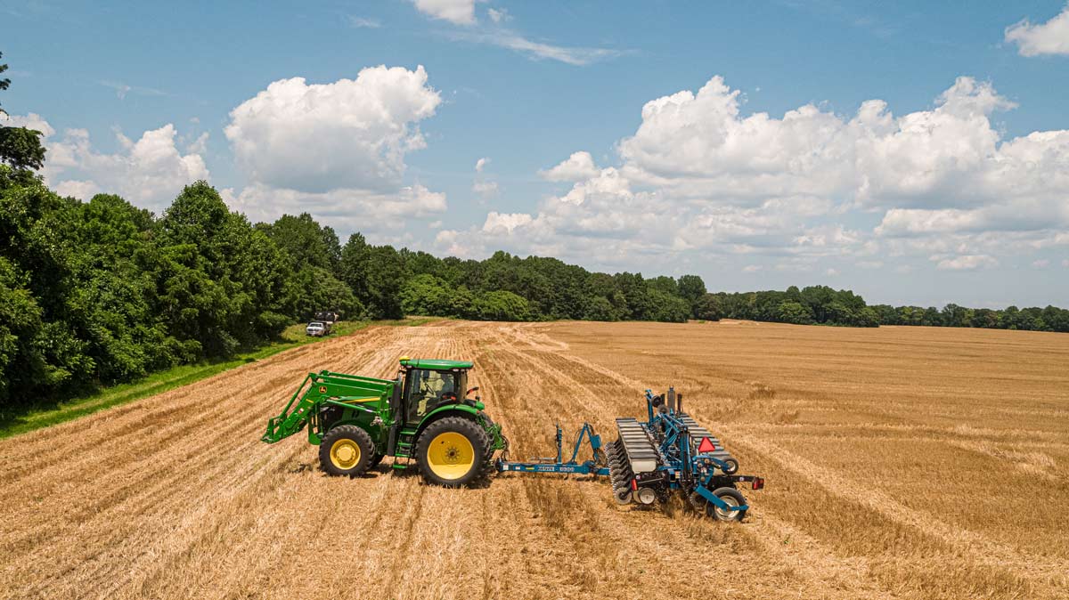 Tractor Mowing Large Field