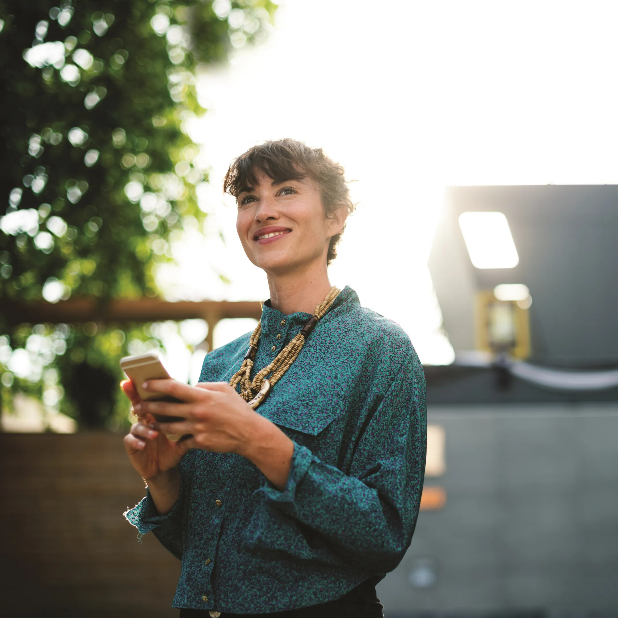 Woman smiling at phone
