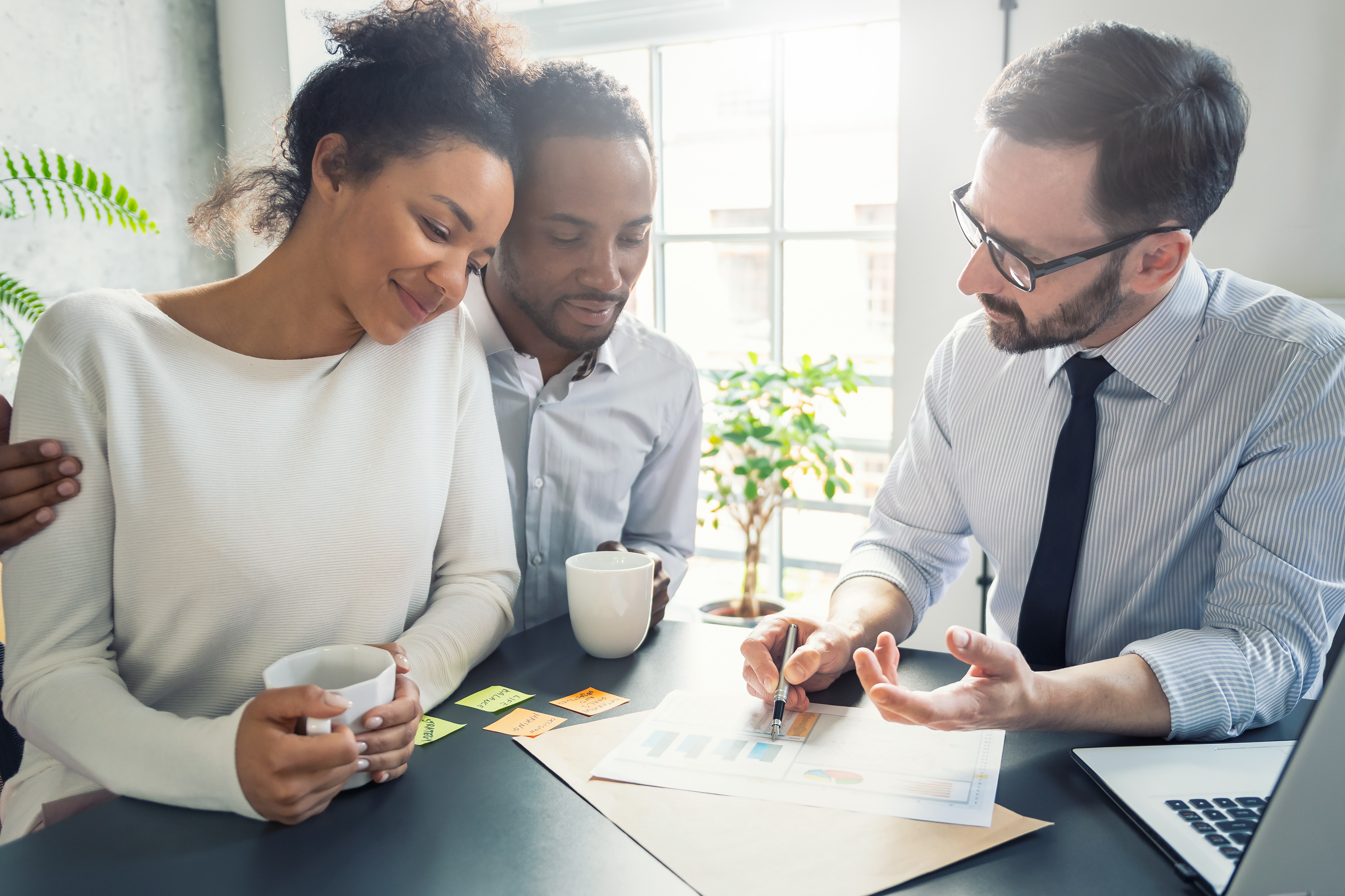 Couple Talking To Financial Advisor