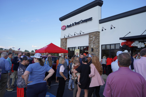 Crowd gathered around the new Morristown, TN full-service office for the Grand Opening ribbon cutting