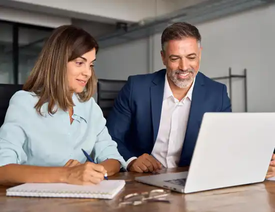 Young Business Woman And Man In Meeting