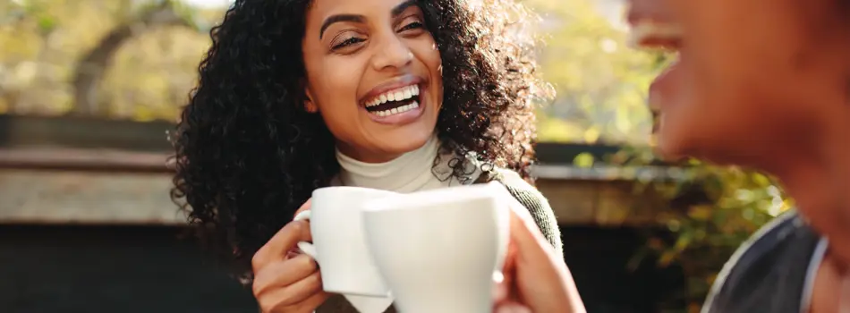 Image Two Women Drinking Coffee