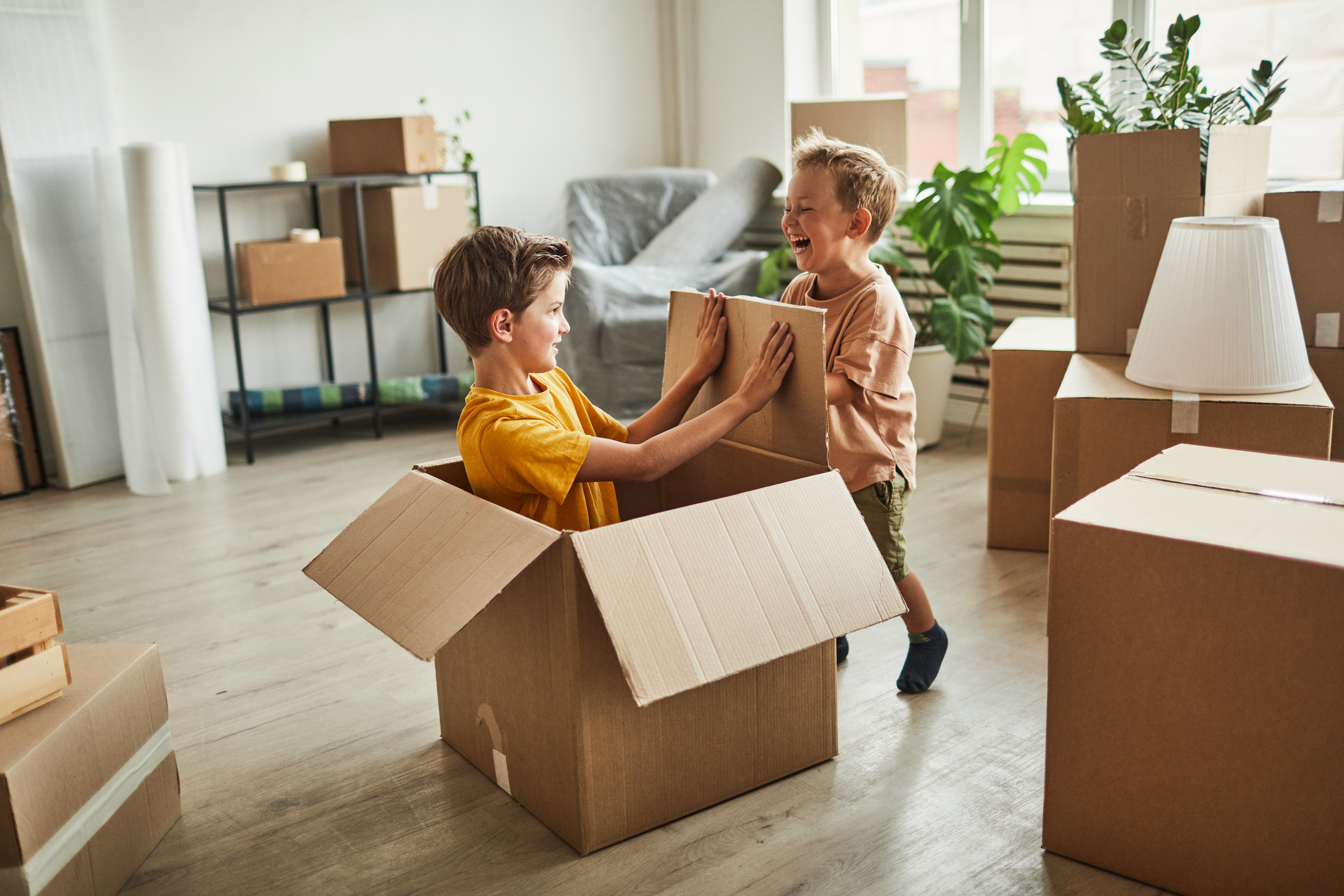 Boys Playing With Boxes In New Home 2022 01 18 23 58 44 Utc