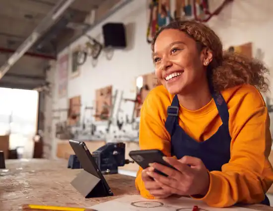 African American Woman In Yellow Shirt Smiling