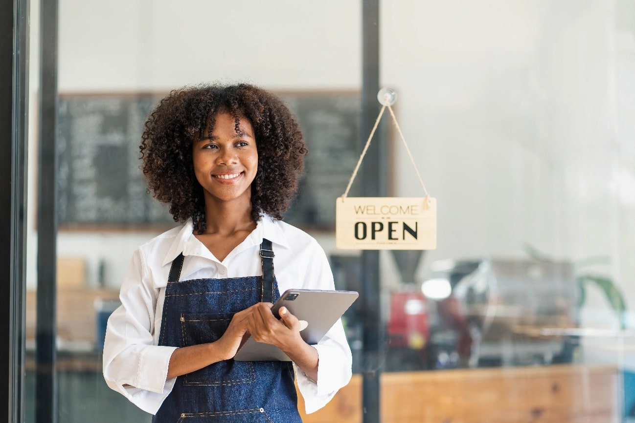 Woman Standing Holding Clipboard